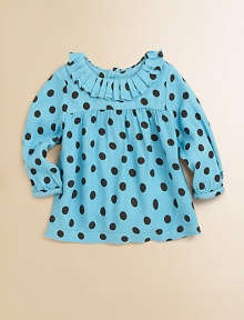 Bursting with polka dots and pleats, this cozy woven top has back buttons and long sleeves.Round neckline with pleatsLong sleevesBack buttonsCottonMachine washImported Please note: Number of buttons may vary depending on size ordered. 