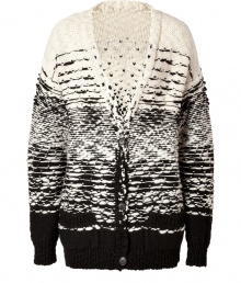 Perfect for wearing with edgy leather leggings, Iros chunky knit cardigan is a contemporary cozy choice, guaranteed to keep your cool weather look chic - V-neckline, long sleeves, ribbed trim, front patch pockets - Easy straight silhouette - Wear with button-downs, form-fitting trousers and chunky ankle boots