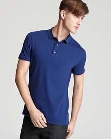 Cotton pique is blended for a bit of stretch on this classic fit polo from Elie Tahari, designed for maximum comfort and traditional appeal.