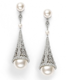 Do elaborate. Add elegance and excellence in Eliot Danori's exquisite cone-shaped crystal-accented drop earrings. Crafted in rhodium-plated mixed metal with simulated pearl drops and simulated pearl accents (4, 8, and 12 mm). Approximate drop: 2-1/4 inches.