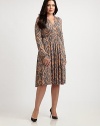 Simple-yet-stunning, this jersey dress with a hint of stretch features a waist-defining self-tie detail. You will love the attention its striking print garners.V-necklineLong sleevesPull-on styleAllover printSelf-tie detail at waistAbout 30 from natural waist92% modal/8% spandexDry cleanMade in USA