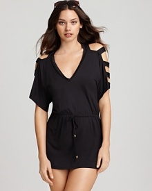 PilyQ's peekaboo coverup is city slick in matte black silk with edgy shoulder cutouts.