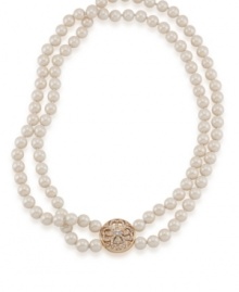 The epitome of elegance: Whether you wear it every day for work or save it for a special occasion, Carolee's double-strand pearl necklace is a timeless, elegant piece you'll cherish. Crafted with glass pearls and crystals (on the decorative closure) in gold tone mixed metal. Approximate length: 18 inches.