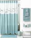 There are plenty of fish in the sea. Swim into a serene beach haven with this Nantucket shower curtain, featuring enchanting silver fish on a cool blue backdrop for a soothing presentation. Finished with mosaic glass trim.