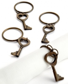 Unlock the secret to a stylish table setting with skeleton key napkin rings from Excell. Featuring an antique finish in solid brass.