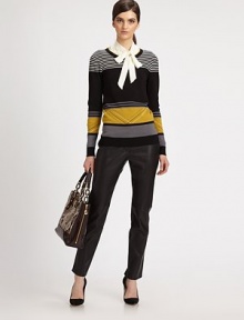 Graphic-charged stripes give this lightweight knit the right touch of eye-catching detail that's become a staple of any Milly design.CrewneckLong sleevesRibbed trimPullover styleAbout 24 from shoulder to hem72% viscose/28% polyesterDry cleanImportedModel shown is 5'9½ (176cm) wearing US size Small.