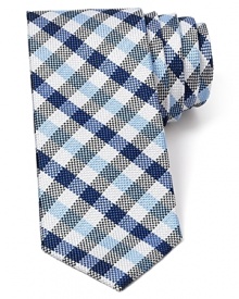 A nostalgic multi-tone check pattern features a narrower width for a modern silhouette and is crafted in plush silk.