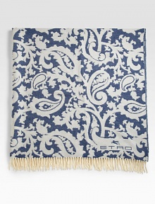 A bold paisley design renews the classic throw, woven in Italy from fine merino wool with fringed ends and versatile style. Fringed endsLogo corner detail59 X 75Merino woolDry cleanMade in Italy