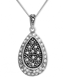 Genevieve & Grace knows glam. This shimmering teardrop pendant combines round-cut crystals and marcasite in a sterling silver setting. Approximate length: 18 inches. Approximate drop: 1 inch.