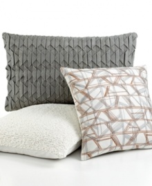 Gathered ivory fabric creates a textural surface on this Bar III Moto decorative pillow, making it a focal point on your bed.