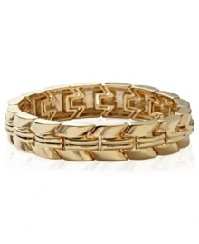 Chevrons star in this stretch bracelet from Fossil. Crafted from gold-tone mixed metal. Approximate diameter: 2-1/4 inches.