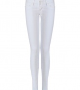 Elevate your casual look with these bright white skinnies from True Religion - Low-rise, classic five-pocket styling, slim fit, skinny leg - Style with an oversized blouse, a boyfriend blazer, and embellished ballet flats