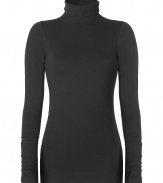 Ultra soft in cotton stretch, Vinces black turtleneck is a great way to ground your basics - Turtleneck, long sleeves - Long lean fit - Wear tucked into a pencil skirt with opaque tights and heels, or pile over layers on extra chilly days