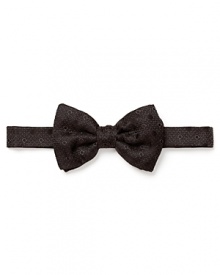 Add verve to your formal attire with a spruced-up bow tie from Salvatore Ferragamo, rendered in soft Italian silk for the look and feel of luxury.