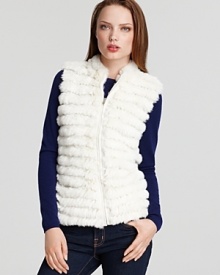 A luxurious knit rabbit fur vest adds a wow factor to any ensemble.