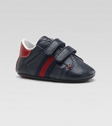 Soft, enduring leather for your little guy, with double straps and signature striped web detailing.Leather upperGrip-tape close strapsContrast leather heelRubber soleMade in Italy