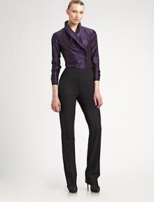 An elegant design, with a concealed button-down front and a unique overlapping wing collar.Wing collar Button-down front and button cuffs Silk Dry clean Imported of Italian fabric