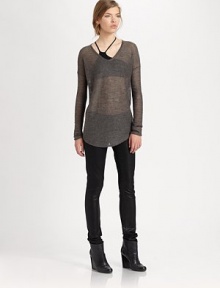 From the HELMUT capsule collection. Semi-sheer alpaca and silk sweater has dropped shoulders and an asymmetrical, cropped back hem. Rounded v-neckDropped shouldersLong sleevesCropped back asymmetrical hem70% alpaca/30% silkDry cleanImportedModel shown is 5'10 (177cm) wearing US size Small.