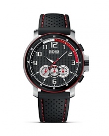 Inspired by the outlook of motorsport cockpits, this chronograph watch features three interconnected counters and black perforated silicone strap with red stitching for a distinctive sporty design. From HUGO BOSS.