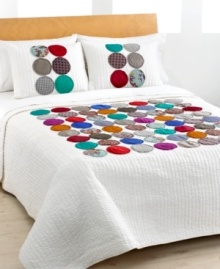 Round out your bedroom with a new look of chic. The Circles quilt offers and eclectic appeal with eye-catching appliqués in prints and solids on a background of soft white. (Clearance)