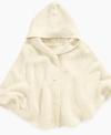 This adorable Guess poncho will wrap her up in super soft style.