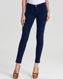 Tailored in a sleek, skinny silhouette, these J Brand jeans are fashioned in an inky hue for an elevated take on must-have denim.