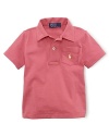 An adorable pocketed polo shirt is crafted from super-soft cotton jersey for a breathable, comfy fit.