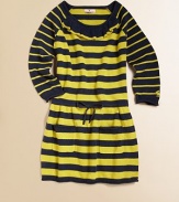 Sweet stripes in sweater-soft knit, detailed with a ruffle at the neck, rolled hems and patch pockets.Round banded neckline with ruffleLong raglan sleeves with ribbed and rolled cuffs, one with Juicy logoSlightly dropped waist with stitched bowPatch pocketsRibbed and rolled hemPullover styling60% cotton/30% nylon/10% angoraMachine washImported