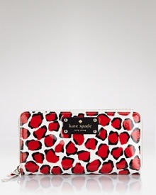 kate spade new york's latest zip-around wallet features a pebble print that is perfectly playful. With credit card slots, billfold, and a zip-top coin compartment, it's sure to keep the essentials safely stowed.