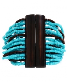 A touch of turquoise on your wrist. This Kenneth Cole New York bracelet features multiple strands of turquoise and brown seed beads joined by a stark brown closure. Stretches for a customized fit. Approximate length: 7-1/2 inches.