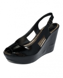 Take advantage of the warmer days with the caged style of Kenneth Cole Reaction's Soley U platform wedge sandals.