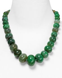 Kenneth Jay Lane's graduated beaded necklace will instantly transform closet staples. This style refuses to blend in, so showcase the agate beads over a basic neckline.