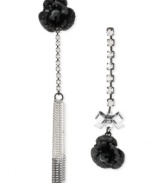 Everything's coming up roses. This pair of mismatch drop earrings from Betsey Johnson is crafted from silver-tone mixed metal with black glittery roses and glass accents for an eclectic touch of elegance. Approximate drop: 2-5/8 inches to 3-1/2 inches.