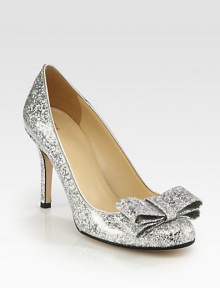 Dazzling pump in glittery patent leather with a bow-trimmed toe. Self-covered heel, 3¾ (95mm)Glitter-coated patent leather upperLeather lining and solePadded insoleMade in Italy