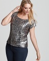 An all-over leopard sequin pattern infuses this Jones New York Collection top with high-impact shine, creating a spot-on look for your next social affair.