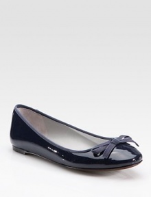 Patent leather staple with grosgrain trim and a delicate bow. Patent leather upperLeather lining and solePadded insoleImported