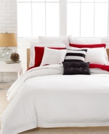 Clean, casual & comfortable. The Solid White comforter set from Lacoste is essential to any well-dressed bed. Brushed twill fabric and over-sized buttoned accents create a classic, preppy look.