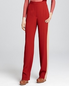 A stately tuxedo stripe lends flattering style to these color-blocked silk pants from Sonia Rykiel.