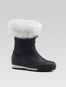 Fluffy fur cuffs cold weather boots with GG fabric shafts and curly shearling linings.Nylon upper Shearling lining Rubber sole Made in Italy