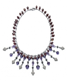 Illuminate the neckline of your favorite party dress with this dazzling collar necklace. Lauren by Ralph Lauren brings on the glamour with this glass and resin bead design in blue and purple hues. Crafted in silver tone mixed metal. Approximate length: 18 inches. Approximate drop: 3 inches.