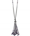 Exotic and elegant. Tassels stand out as a key trend in jewelry this season, and c.A.K.e. by Ali Khan interprets the look in the form of this pretty pendant necklace. Made in mixed metal, it's embellished with glass rondelle beading. Approximate length: 32 inches. Approximate drop: 5 inches.