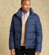 Bundle up for your big treks with this faux-down filled puffer jacket from Tommy Hilfiger.