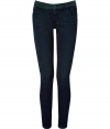 Two looks in one from these skinny jeans in color blocking trend - Features lighter wash with a hint of green at back and waist, and dark blue tinted denim at front - Classic five-pocket design with belt loops, botton closure and zip fly - Hint of stretch creates a figure-flattering look - Cropped at ankle - Pair with ballet flats, silk tank and moto style leather jacket