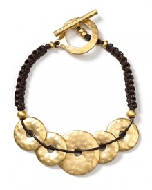 Lauren by Ralph Lauren's Grecian-inspired bracelet is a modern statement. With hand-hammered discs and braided detailing, this is a bold accessory that can stand alone.