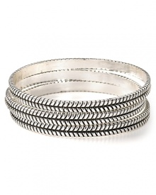 Simple yet striking this set of hammered bangles from Lauren Ralph Lauren is the perfect everyday accent. Wear them stacked to lend subtle shine to your favorite looks.