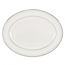 Delicate vines unfurl on soft pewter in the aptly named Sheer Grace oval platter from Lenox. Lustrous white porcelain and bands of sparkling platinum ground the look in understated splendor. Qualifies for Rebate