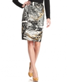 Calvin Klein elevates makes a sleek pencil skirt a statement piece with an abstract, feather-inspired print.