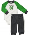 Give a shout-out to one of his favorite all-stars with this sporty bodysuit and pant set from Carter's.