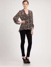 EXCLUSIVELY AT SAKS. Explore your wild side in this semi-sheer, python-print blouse with neck self ties, three-quarter sleeves and a hi-lo hem. V-neck with self tiesButton frontThree-quarter sleevesHi-lo hemPolyesterMachine washImportedModel shown is 5'11 (178cm) wearing US size Small.