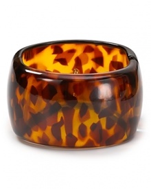 Make a modern meets Mod statement with this tortoise shell cuff from Kenneth Jay Lane, crafted of resin with a hinged closure.